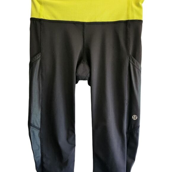 Lululemon Chase Me Black and Lime Green Capri Leggings Size 2 - Picture 1 of 7